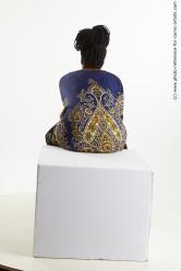 Dina Moses African Woman Sitting Pose